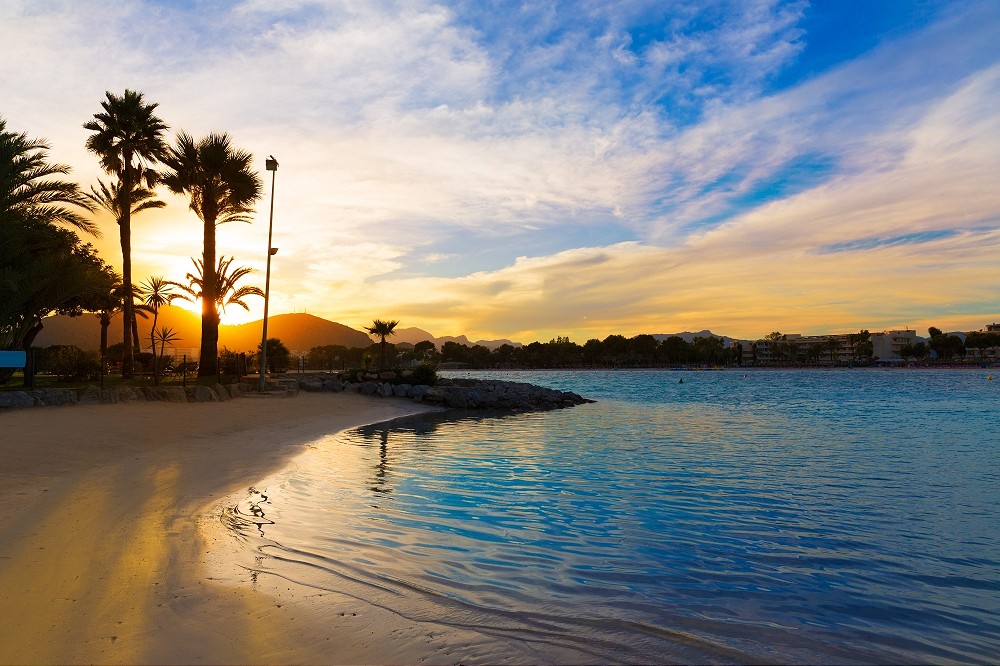 Alcudia Majorca at sunset on the beach Mallorca Balearic islands